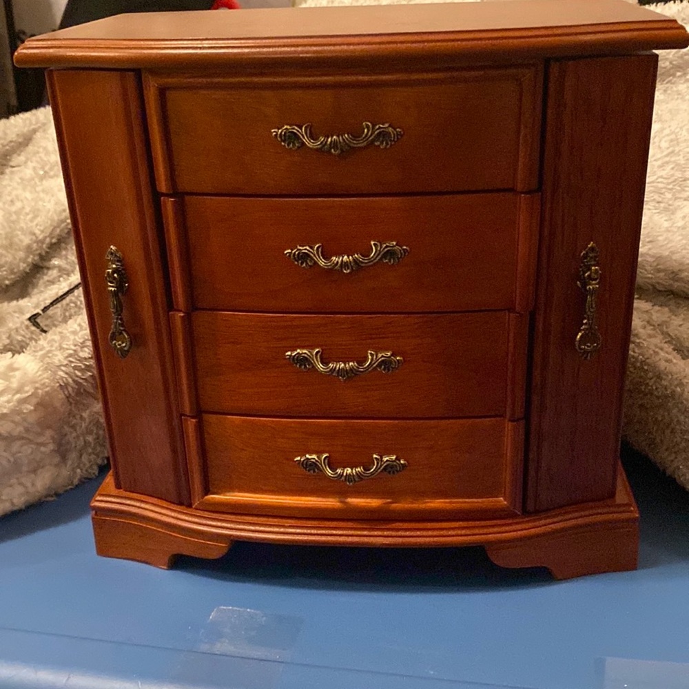 Small wooden Jewelry box with a built in mirror